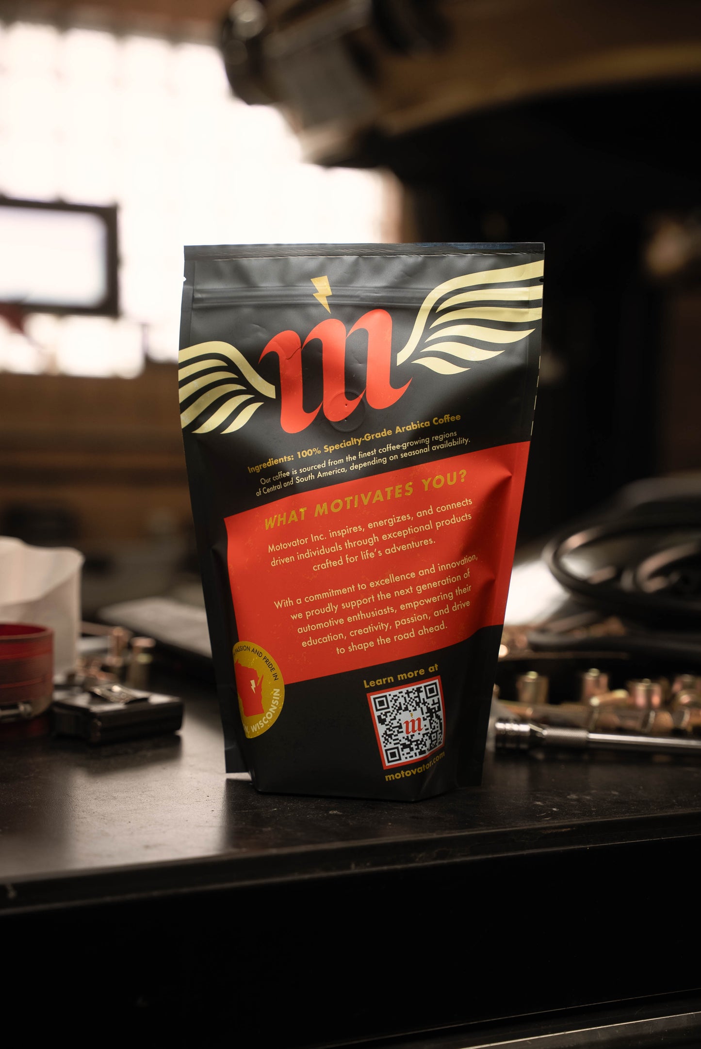 back side of Motovator Coffee bag on a tool box with car parts