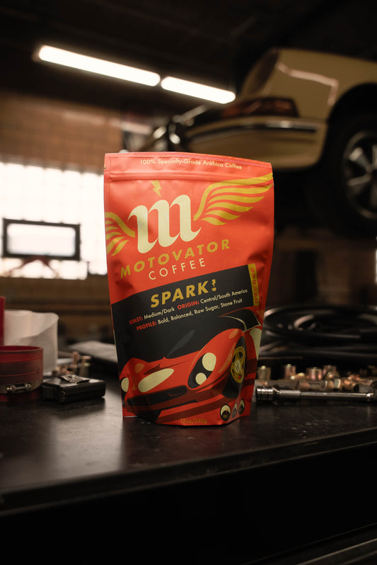 Motovator Spark! coffee on tool chest in a vintage Porsche workshop