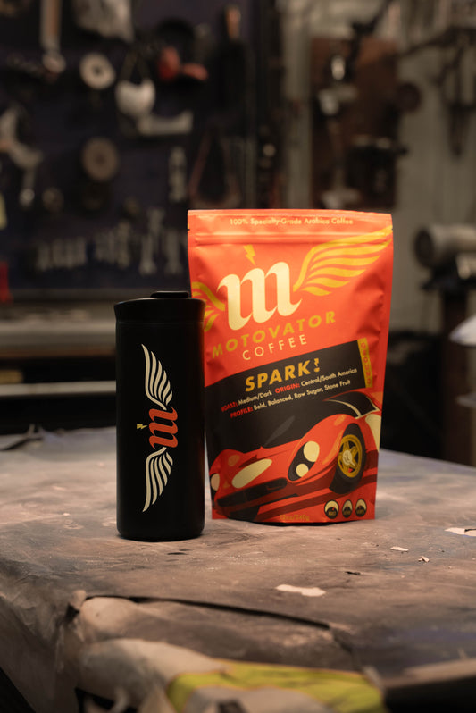 Motowater coffee package and mug on a workshop table