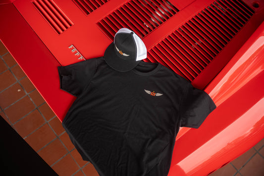 Motovator Tshirt and trucker hat displayed on a red Ferrari car