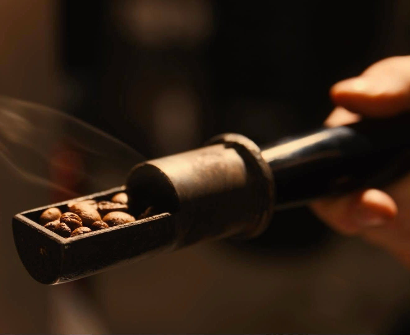 closeup of roasting coffee fresh from the roasting machine