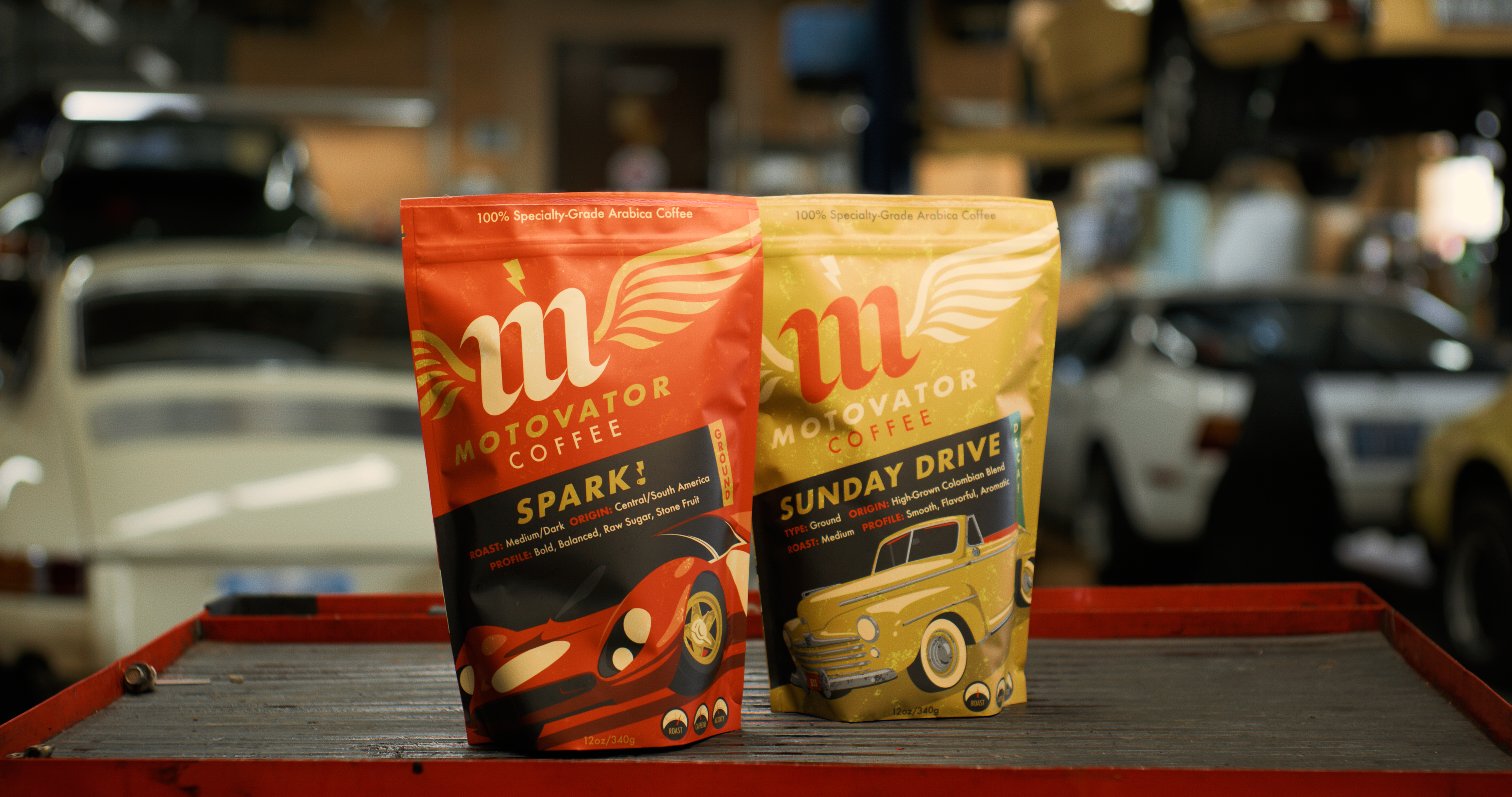 Motovator Coffee -  Spark! and Sunday Drive displayed on a tool cart in a vintage Porsche workshop